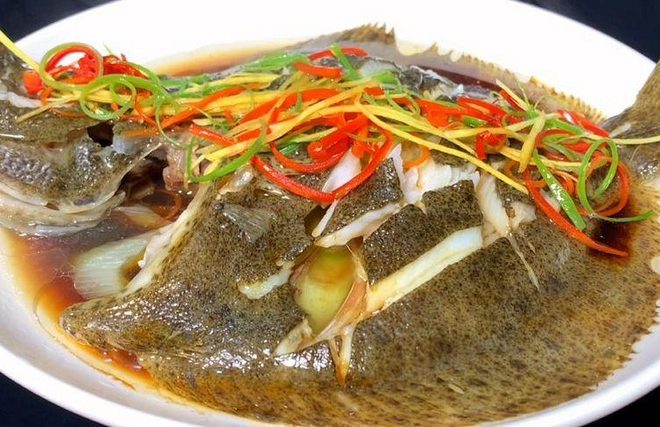 Delicious steamed turbot fish with soy sauce