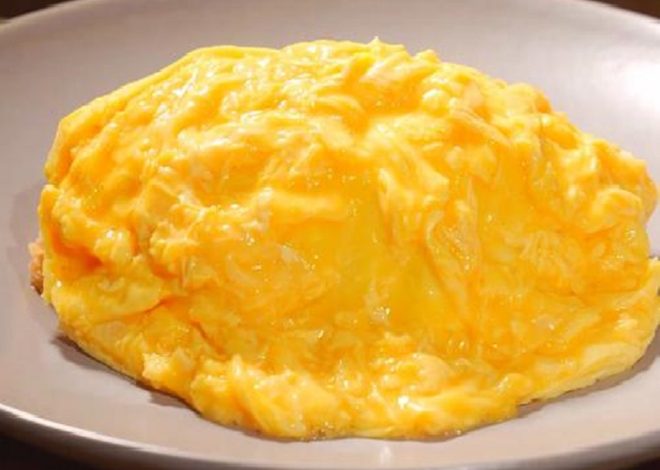 Delicious Fried Rice with Flowing Egg on Top